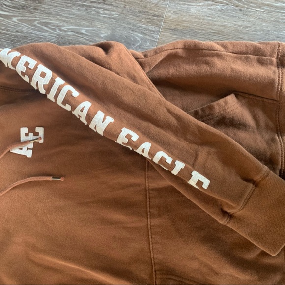 American Eagle brown sweatshirt with white letters. - Picture 4 of 4